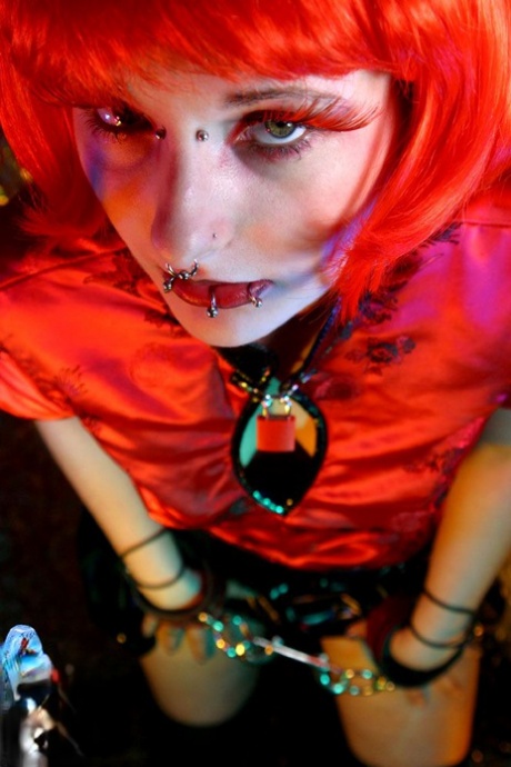 Solo girl with dyed hair and piercings gets naked on her home webcam 85670183