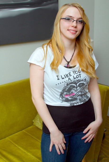 Slender glasses clad Sue Connor peeling her jeans and displaying her big tits 98411033