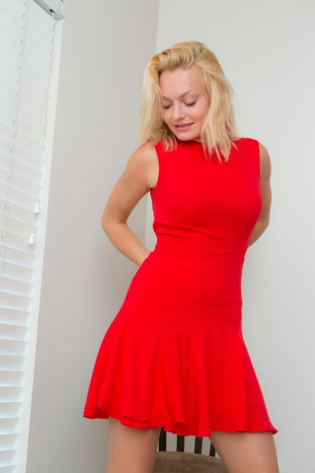 Natural blonde sets her great body free of a red dress during solo action 73678462