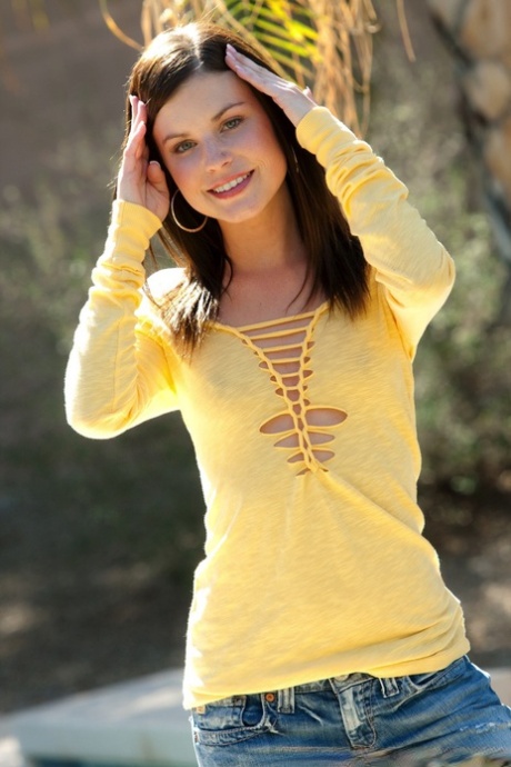 Girl next door type Candy Nichole strips naked in front of a swimming pool 37388163