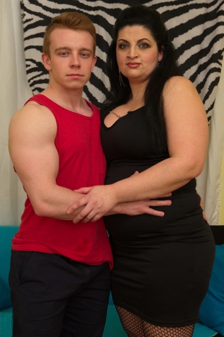 Fat housewife with black hair has her big boobs played with by her toy boy 75288083