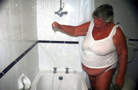 Obese old woman Grandma Libby gets completely naked while having a bath 99615022