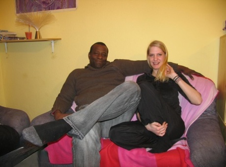 Blonde teen has her first interracial sex experience on a loveseat 15260887
