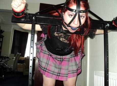 Redheaded plumper spends her day being restrained with bondage devices 89751009