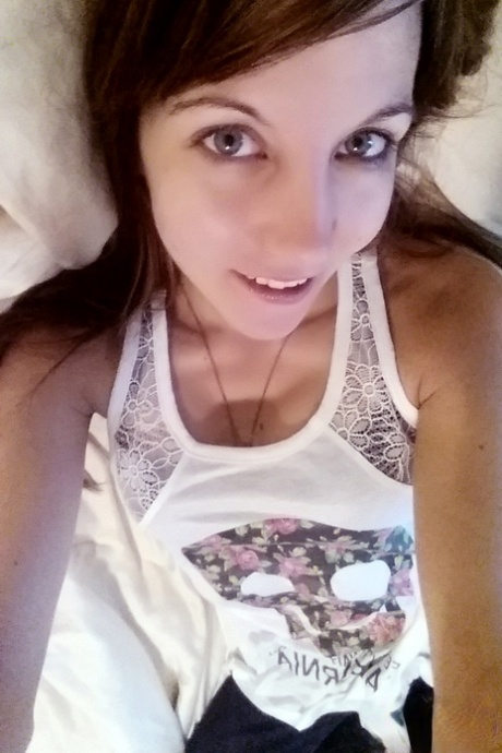 Young brunette Andi Land is captured in clothed and nude candid acts 56189881