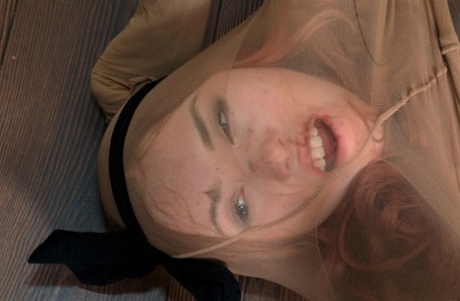 Redheaded student Li Lin covers herself from head to toe in pantyhose 40834260