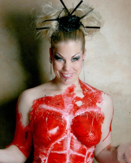 Naked girl is covered in body paint by a woman in latex clothing 36004049