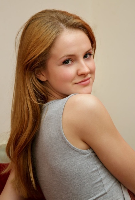 Young redhead Alice May shows the bottoms of her feet while butt naked 22435527
