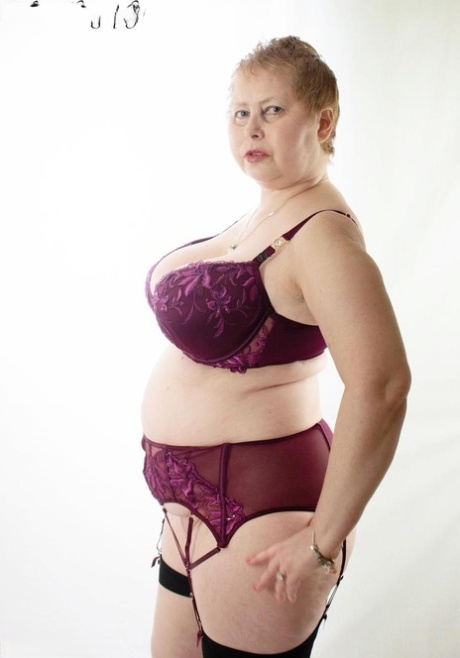 Older plumper Posh Sophia looses her large boobs from a brassiere 14643305