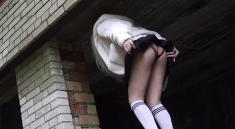 Blonde girl Eva Barbie squats for a pass in an abandoned building 89508697