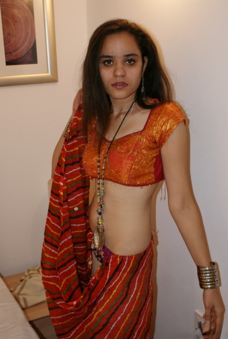 Indian princess Jasime takes her traditional clothes and poses nude 77629573