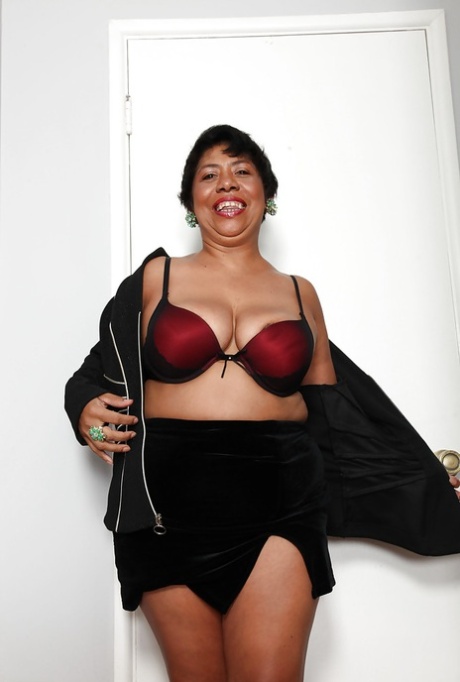 Sassy ebony mature lassie undressing and exposing her twat in close up 50231186